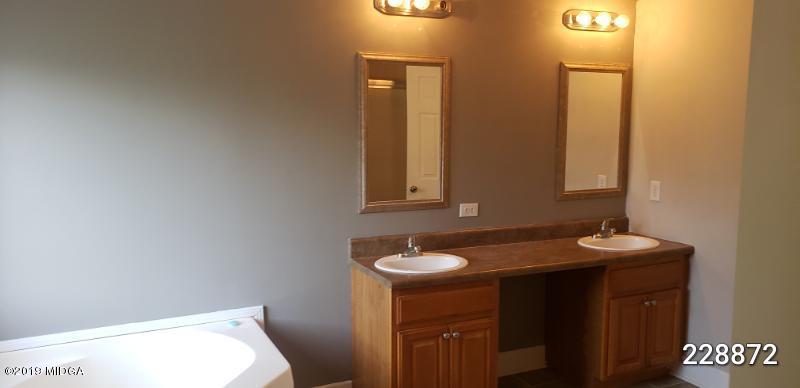 448 Scott Road Elko, GA 31025 - Photo 11 of 13 a bathroom with a sink and a toilet