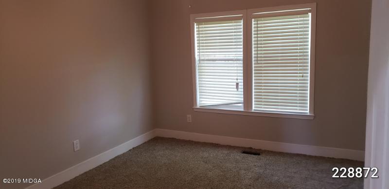 448 Scott Road Elko, GA 31025 - Photo 12 of 13 a view of an empty room with a window