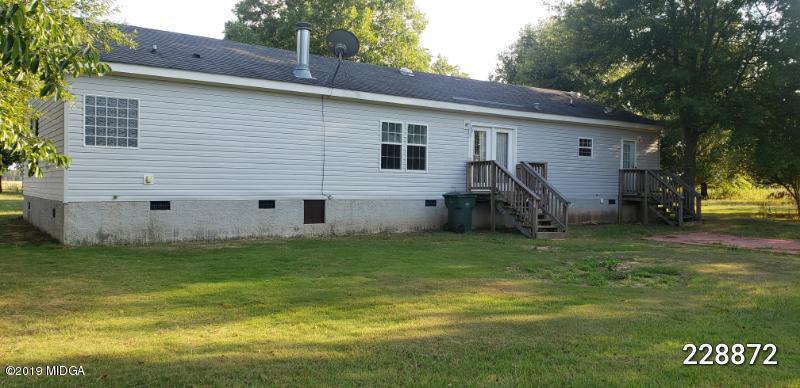 448 Scott Road Elko, GA 31025 - Photo 3 of 13 a view of a back yard of the house