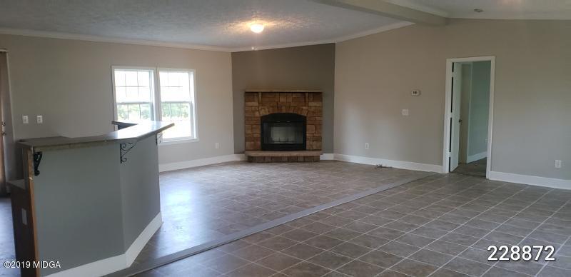 448 Scott Road Elko, GA 31025 - Photo 5 of 13 an empty room with windows