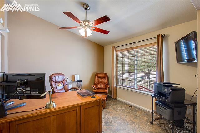 8643 Del Rio Road Peyton, CO 80831 - Photo 6 of 35 Front Den