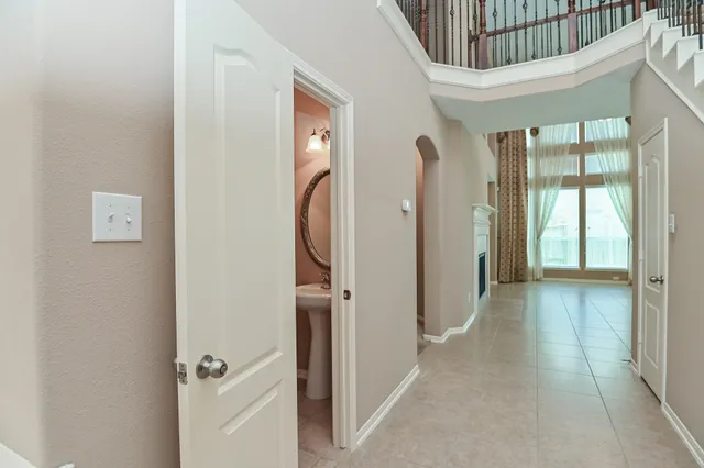 a view of a hallway with a outdoor space