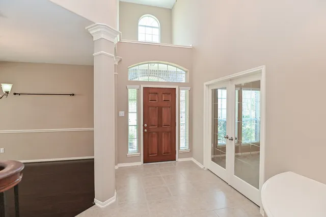 a view of a hallway with windows