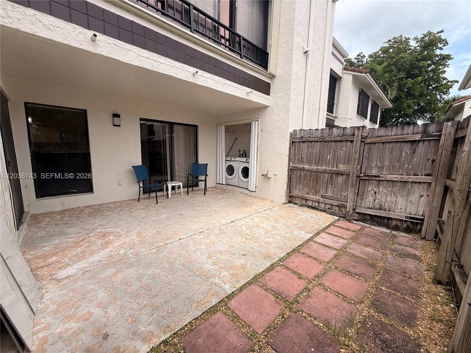 10875 Northwest 7th Street, Unit 1136 Miami, FL 33172 - Photo 24 of 25 a view of a house with wooden floor and roof top