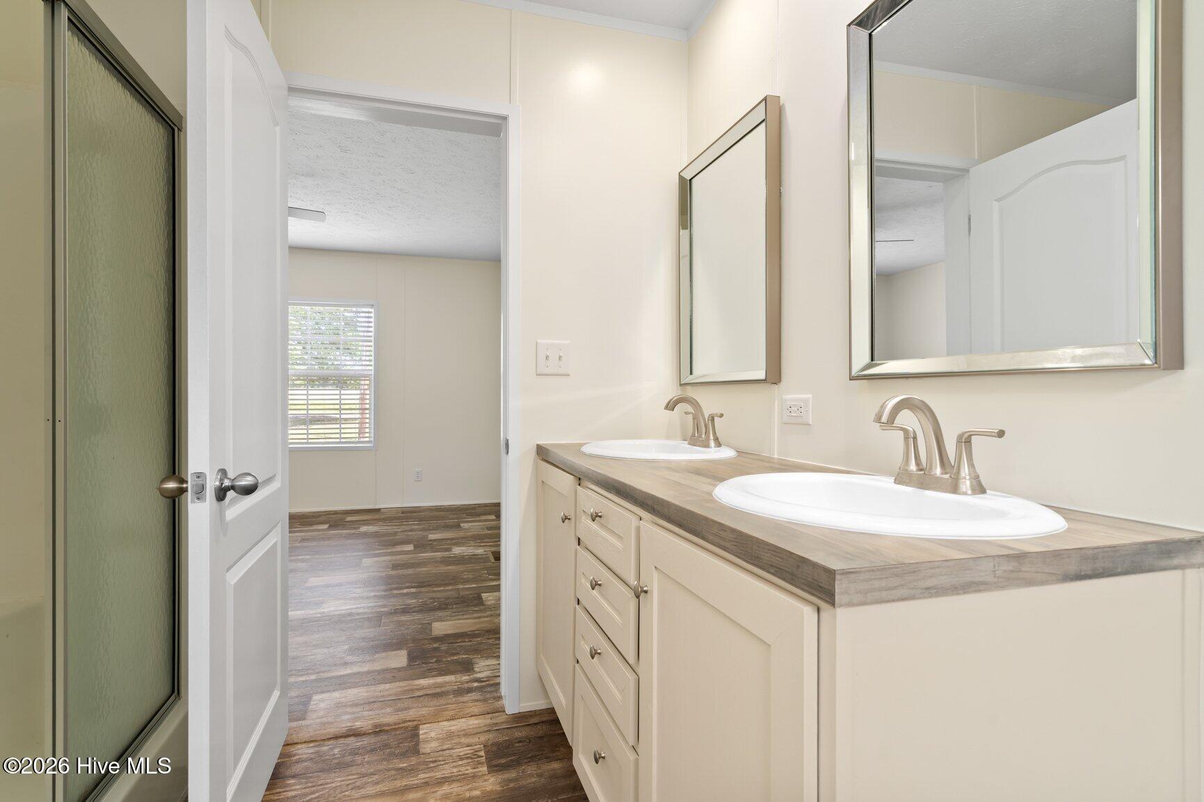 486 Cutchin Farm Road Tarboro, NC 27886 - Photo 30 of 31 and walk-in shower.