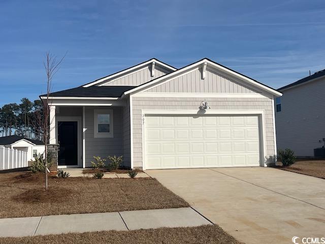 707 El Pepino Loop Longs, SC 29568 - Photo 1 of 10 View of front of house featuring a garage