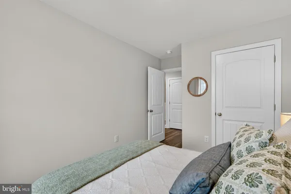a utility room with cabinets washer and dryer