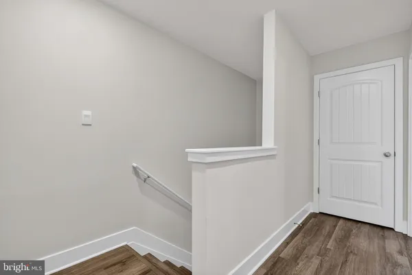 a bedroom with bed and window