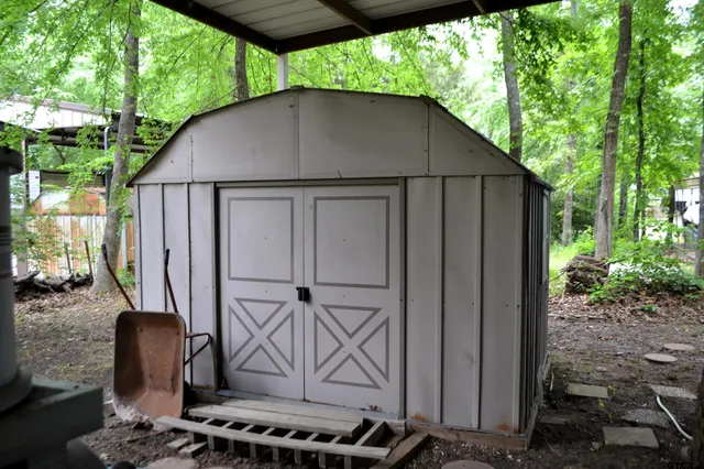 front view of a house with a big yard