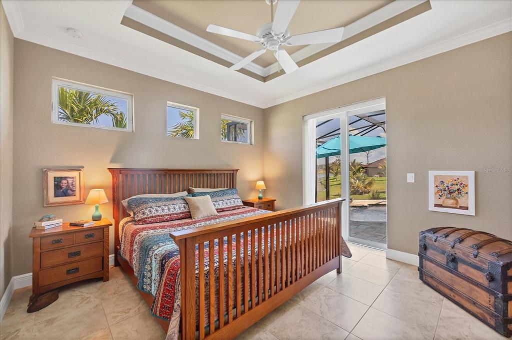 34 Brig Circle South Placida, FL 33946 - Photo 16 of 39 a bedroom with a bed and a couch