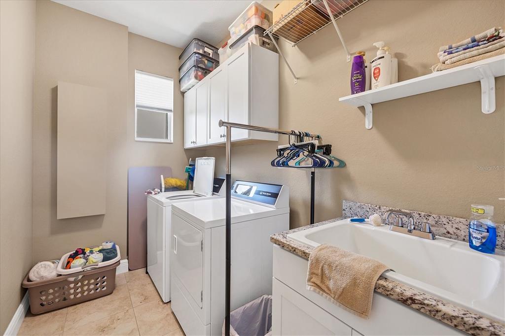 34 Brig Circle South Placida, FL 33946 - Photo 23 of 39 a bedroom with a bed and a table in it