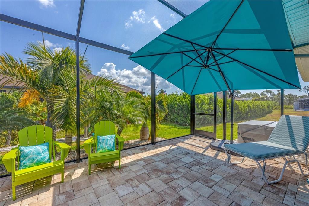 34 Brig Circle South Placida, FL 33946 - Photo 29 of 39 a view of chairs and table in the patio