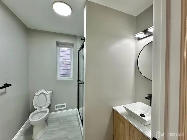 a view of balcony with wooden floor and fence