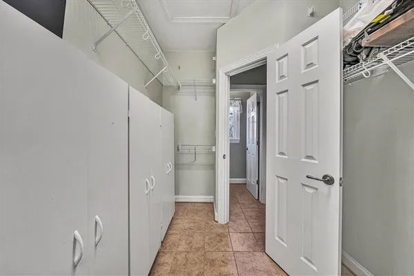a view of a hallway view with wooden floor and staircase