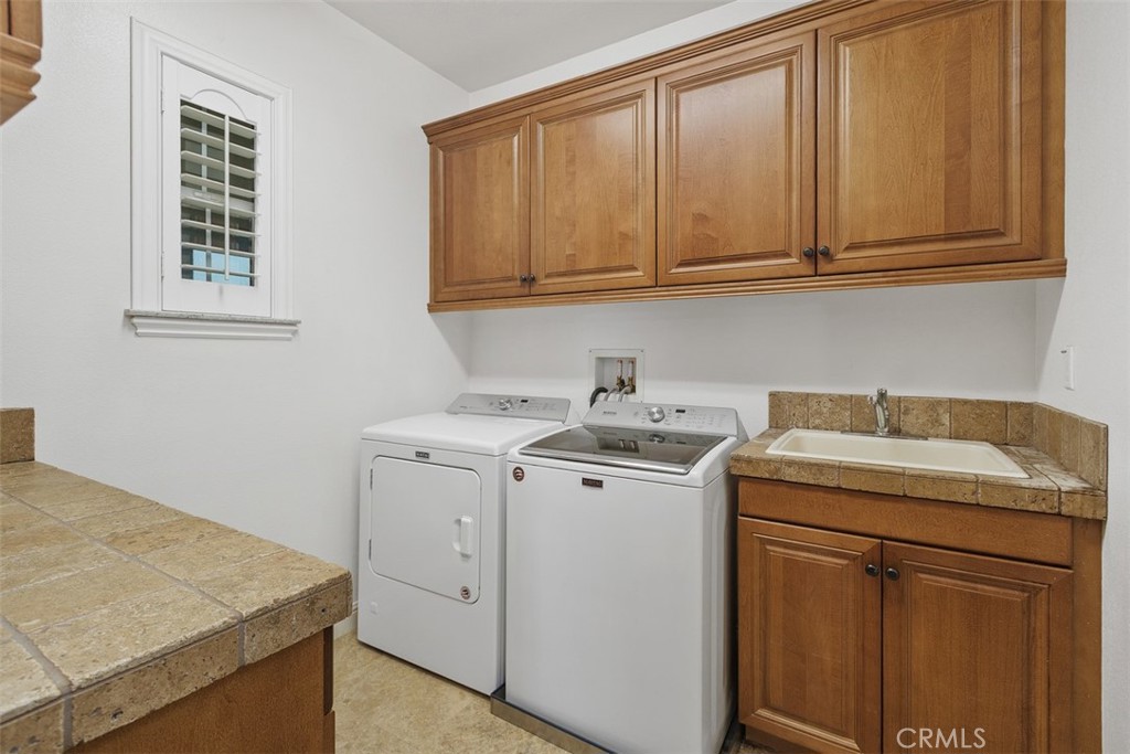 13337 Hunt Club Drive Rancho Cucamonga, CA 91739 - Photo 29 of 45 Laundry room with utility sink
