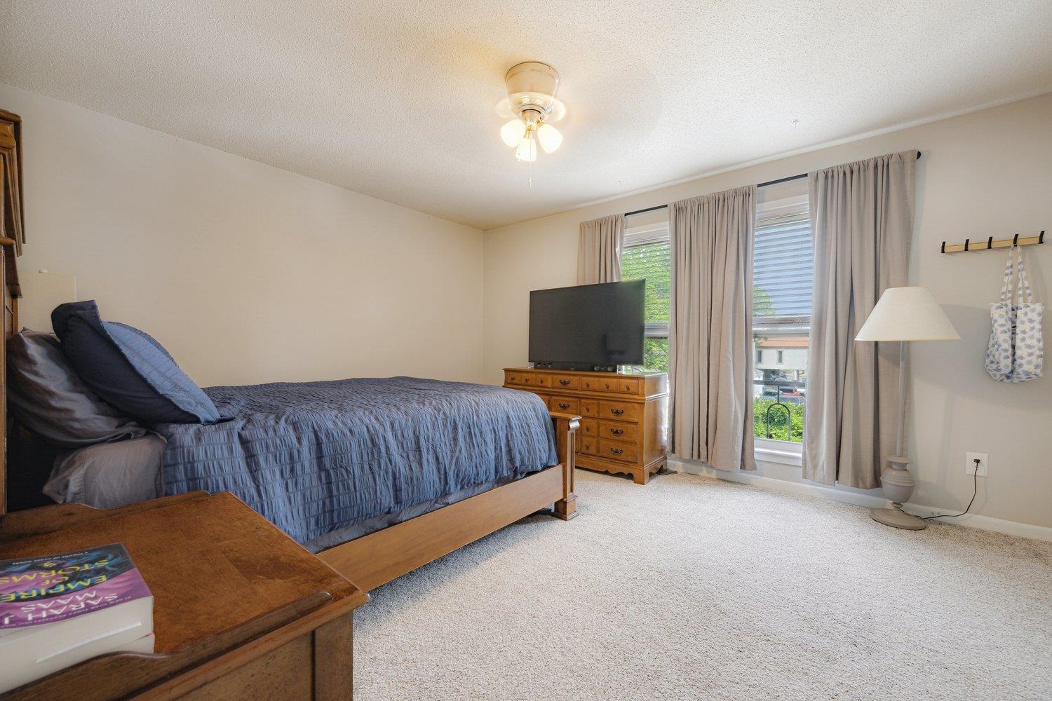 1005 June Road Memphis, TN 38119 - Photo 18 of 22 Bedroom with carpet floors and baseboards