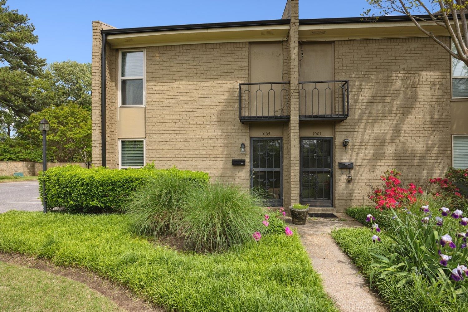 1005 June Road Memphis, TN 38119 - Photo 2 of 22 Townhome / multi-family property featuring brick siding and a balcony