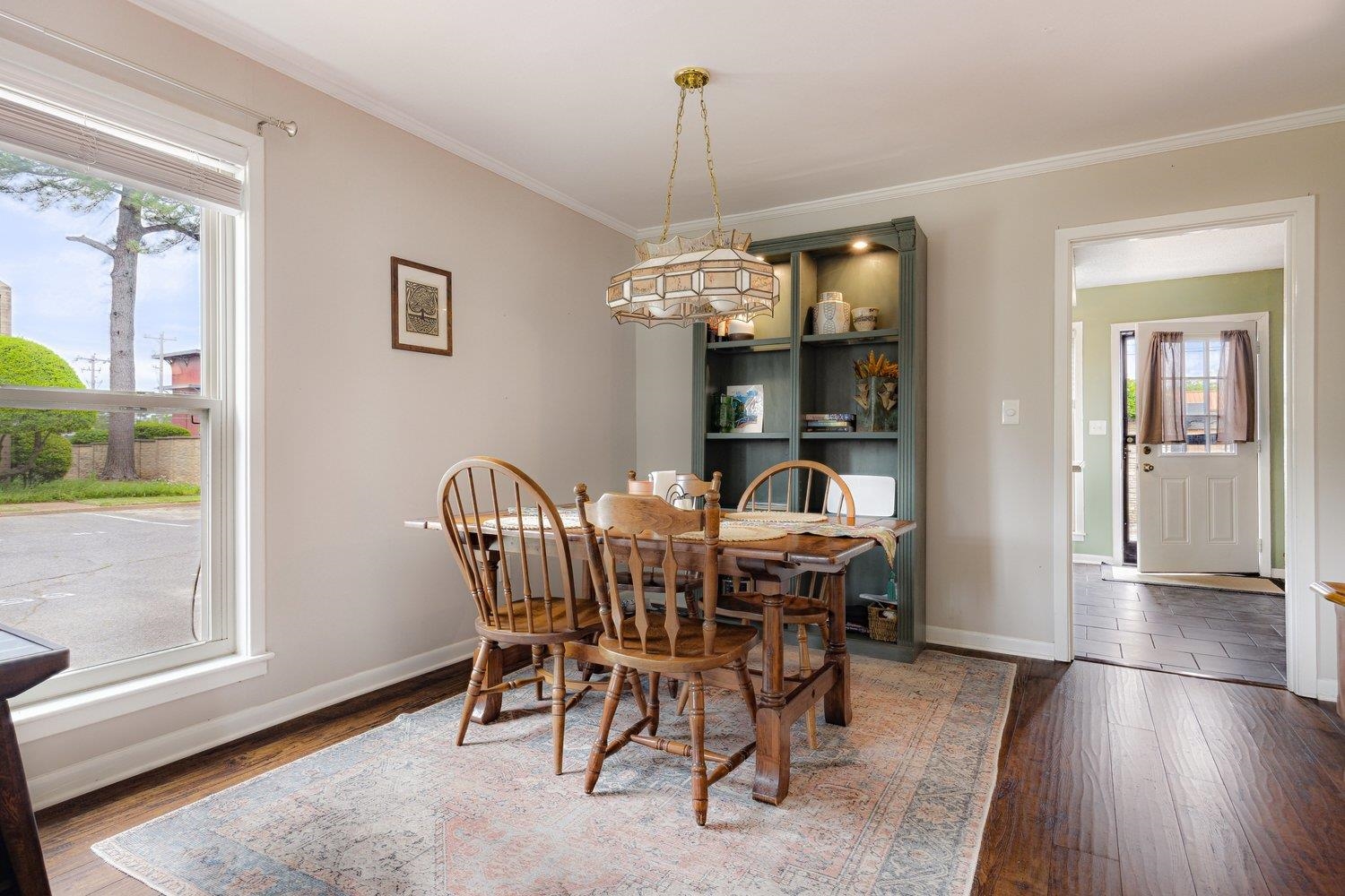 1005 June Road Memphis, TN 38119 - Photo 8 of 22 Dining room with baseboards, ornamental molding, and wood finished floors