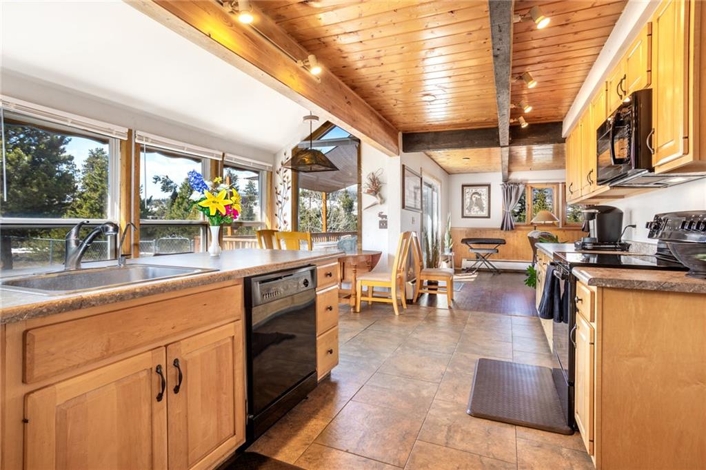567 G Road Silverthorne, CO 80498 - Photo 11 of 32 a kitchen with lots of counter top space