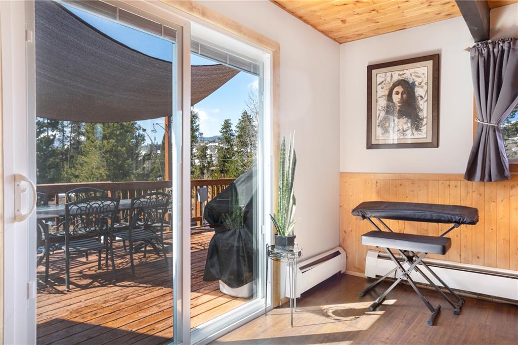 567 G Road Silverthorne, CO 80498 - Photo 14 of 32 a room with furniture and a window