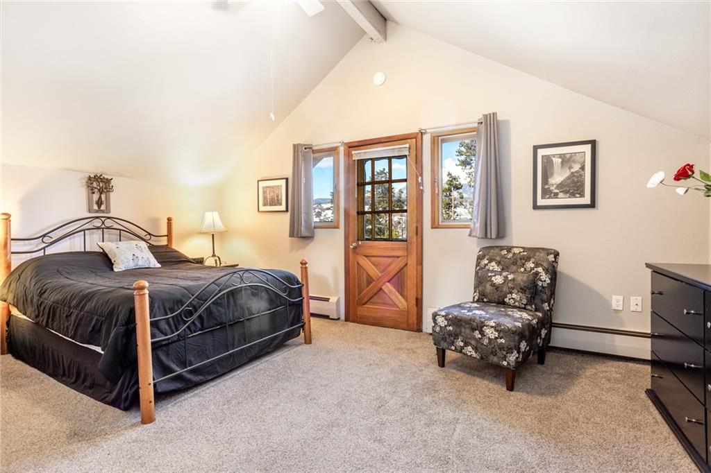 567 G Road Silverthorne, CO 80498 - Photo 20 of 32 a bedroom with a bed and a dresser