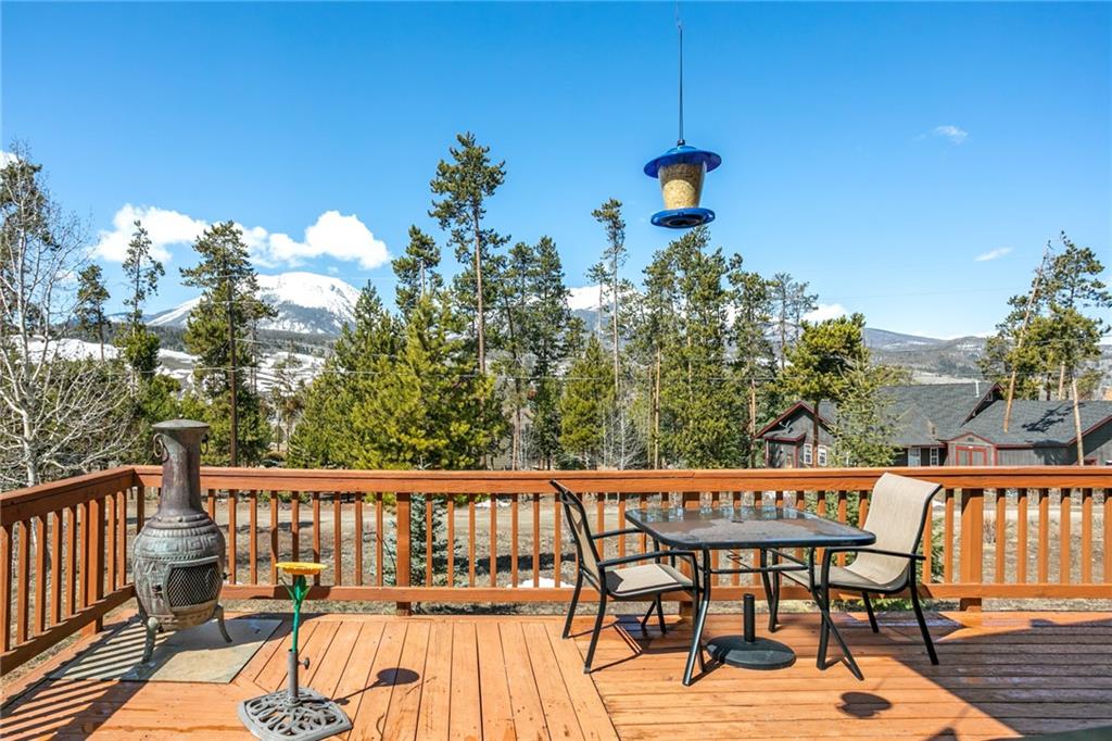 567 G Road Silverthorne, CO 80498 - Photo 25 of 32 a balcony with table and chairs