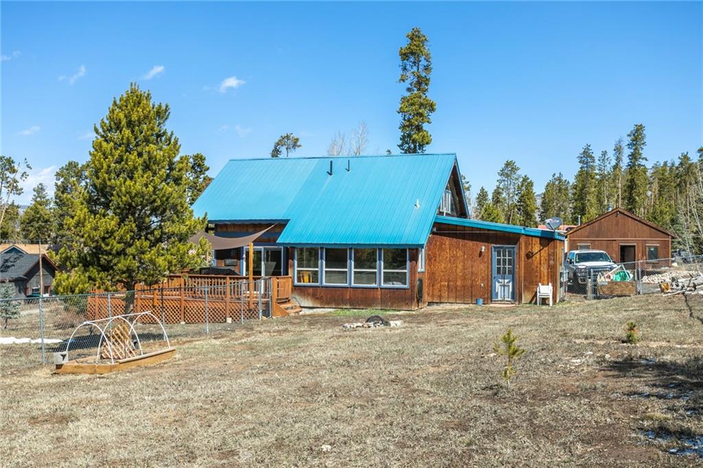567 G Road Silverthorne, CO 80498 - Photo 28 of 32 front view of a house with a yard