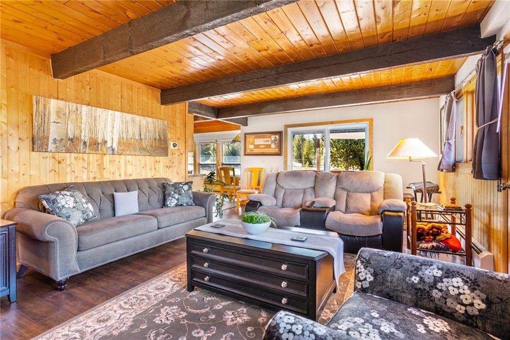 567 G Road Silverthorne, CO 80498 - Photo 7 of 32 a living room with furniture and a large window