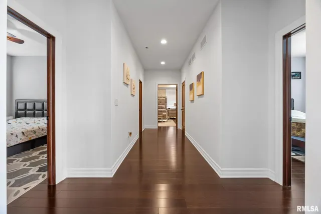 a living room with fireplace furniture and a flat screen tv