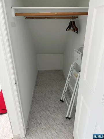 a view of a room with rack on the wall