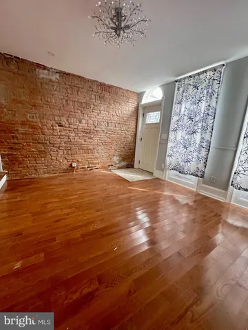 a view of water heater room with window