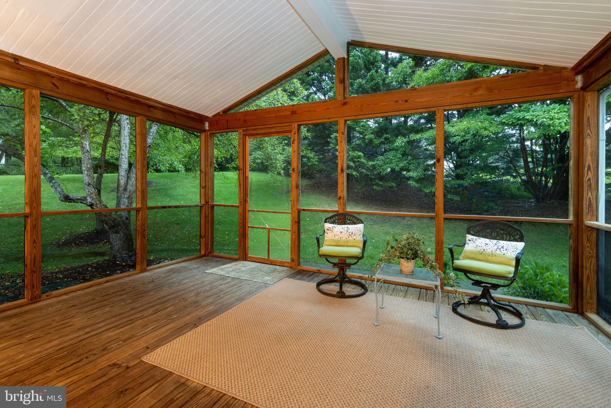 9702 Rambling Ridge Court Fairfax Station, VA 22039 - Photo 4 of 78 Large screened-in porch lets you enjoy the outside