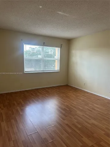 a view of a bathroom from a hallway