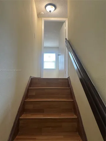 a view of a porch with furniture