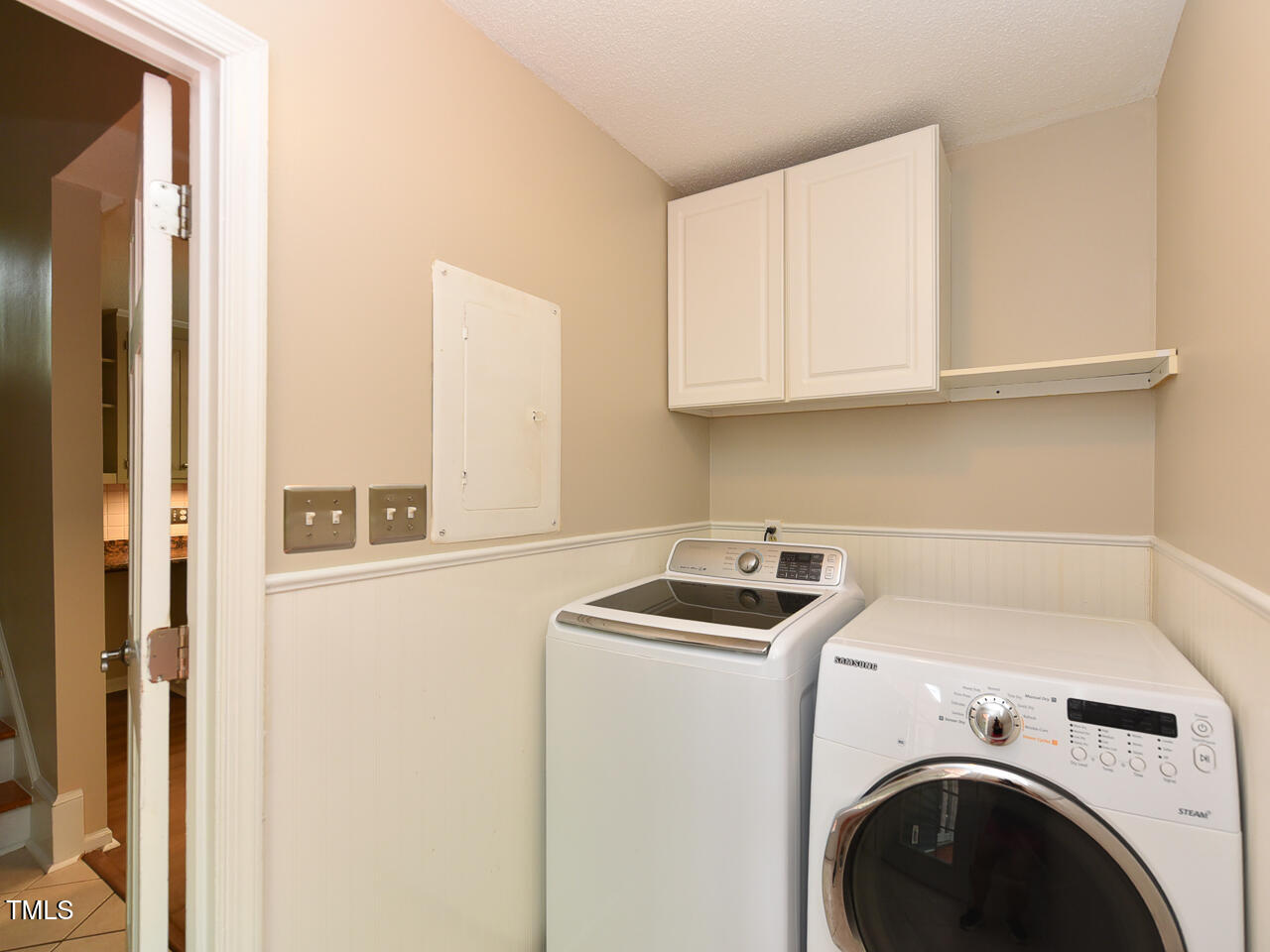 1215 Brookgreen Drive Cary, NC 27511 - Photo 23 of 40 a utility room with dryer and washer