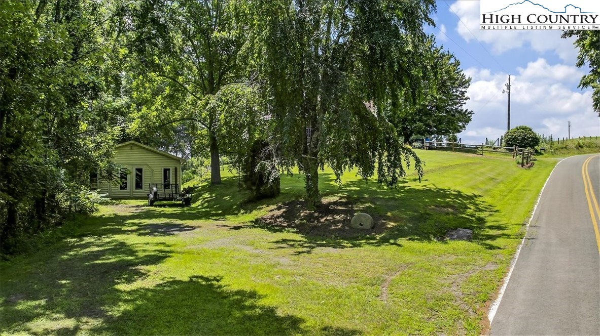 370 Osee Road Sparta, NC 28675 - Photo 28 of 36 a view of a fountain in front of house