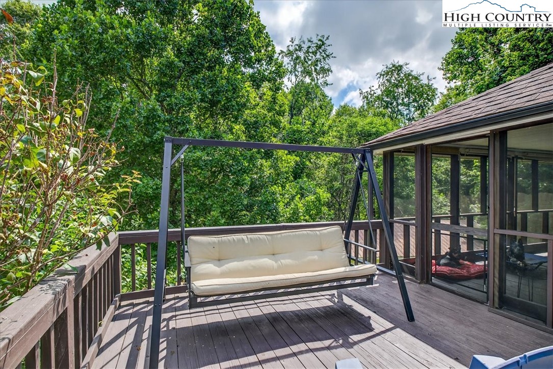 370 Osee Road Sparta, NC 28675 - Photo 6 of 36 a view of a two chairs in the balcony