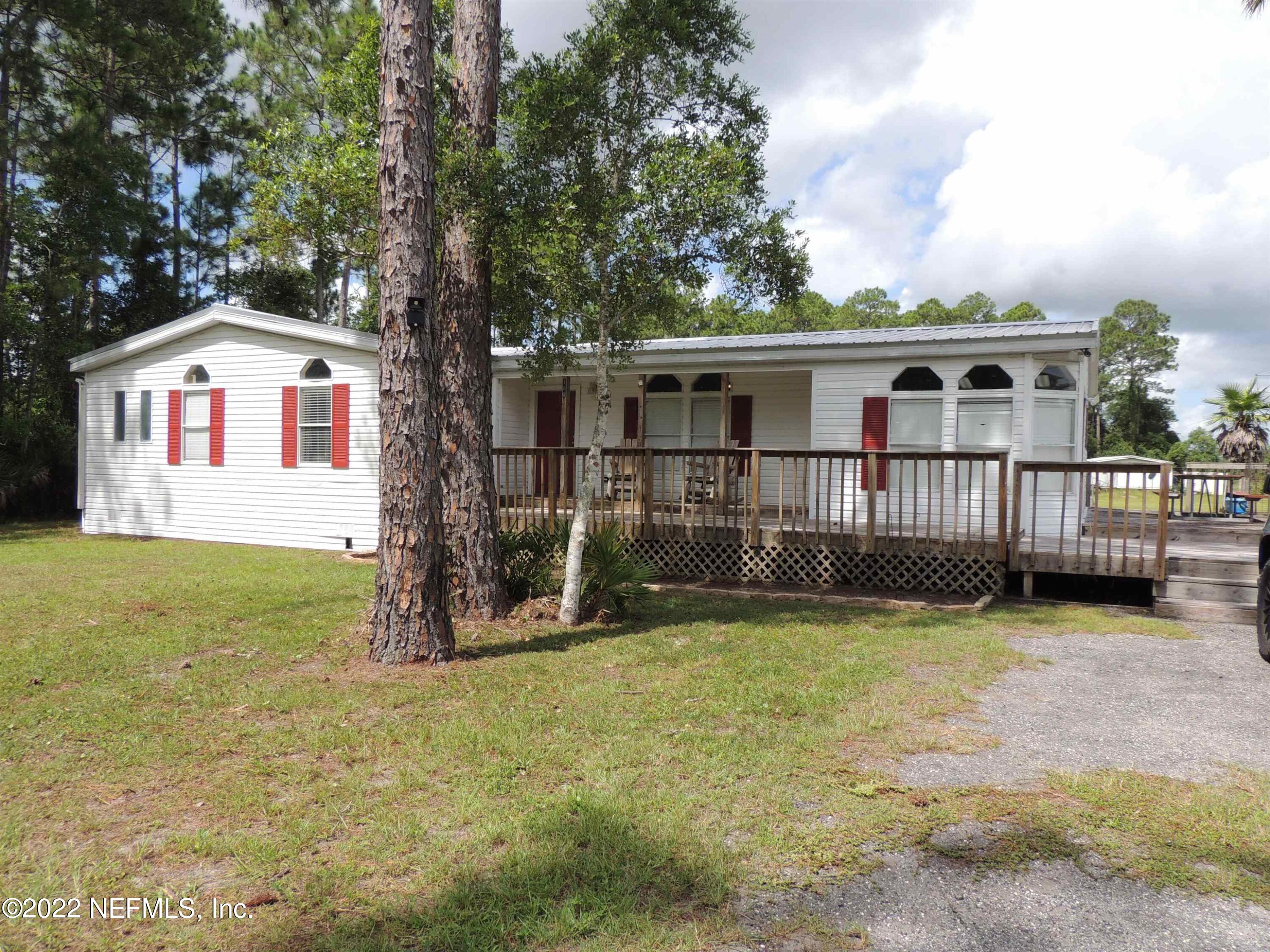 1801 Forbes Road St. Augustine, FL 32092 - Photo 17 of 28 a view of backyard with deck