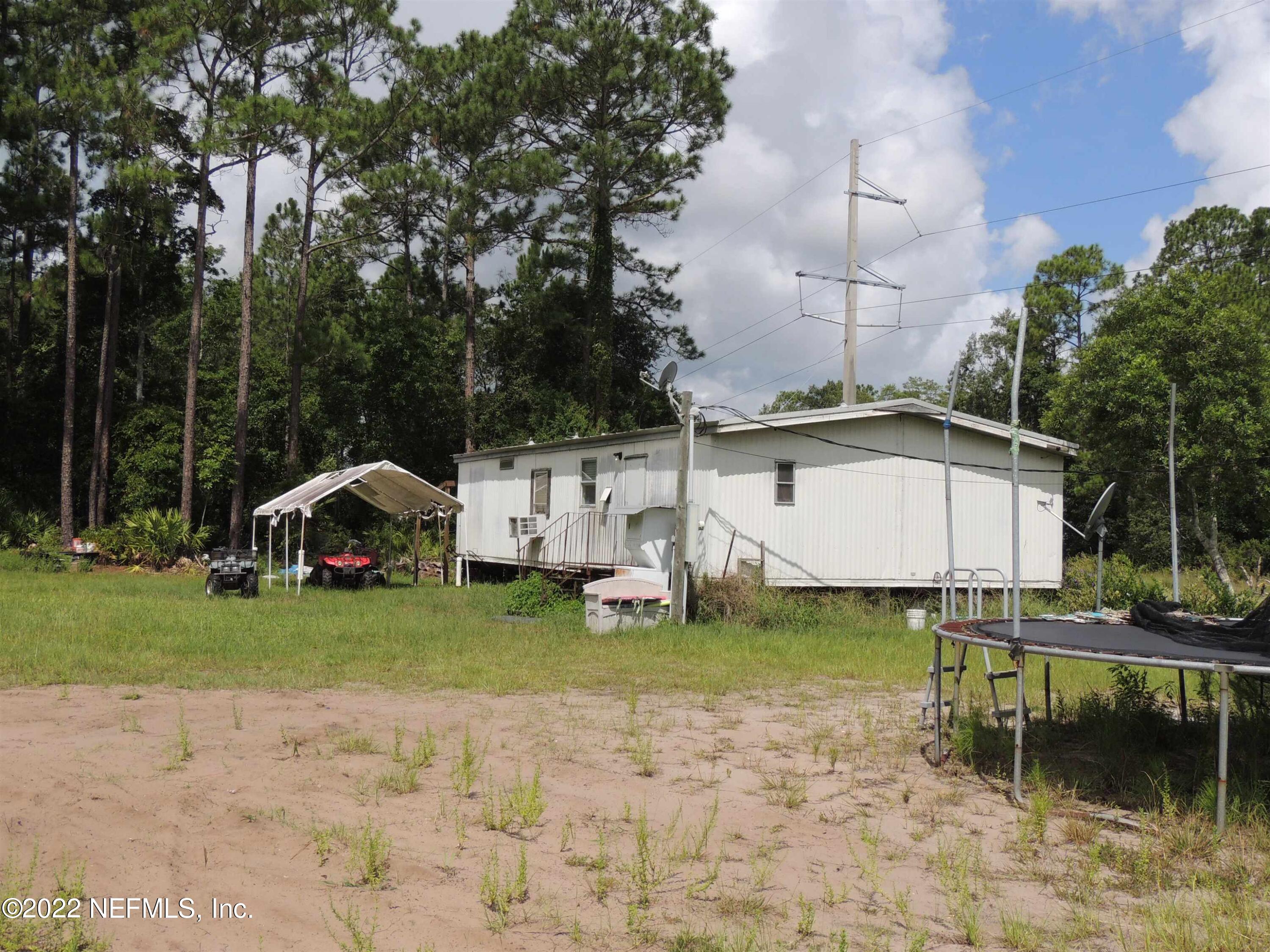 1801 Forbes Road St. Augustine, FL 32092 - Photo 18 of 28 a view of a house with backyard