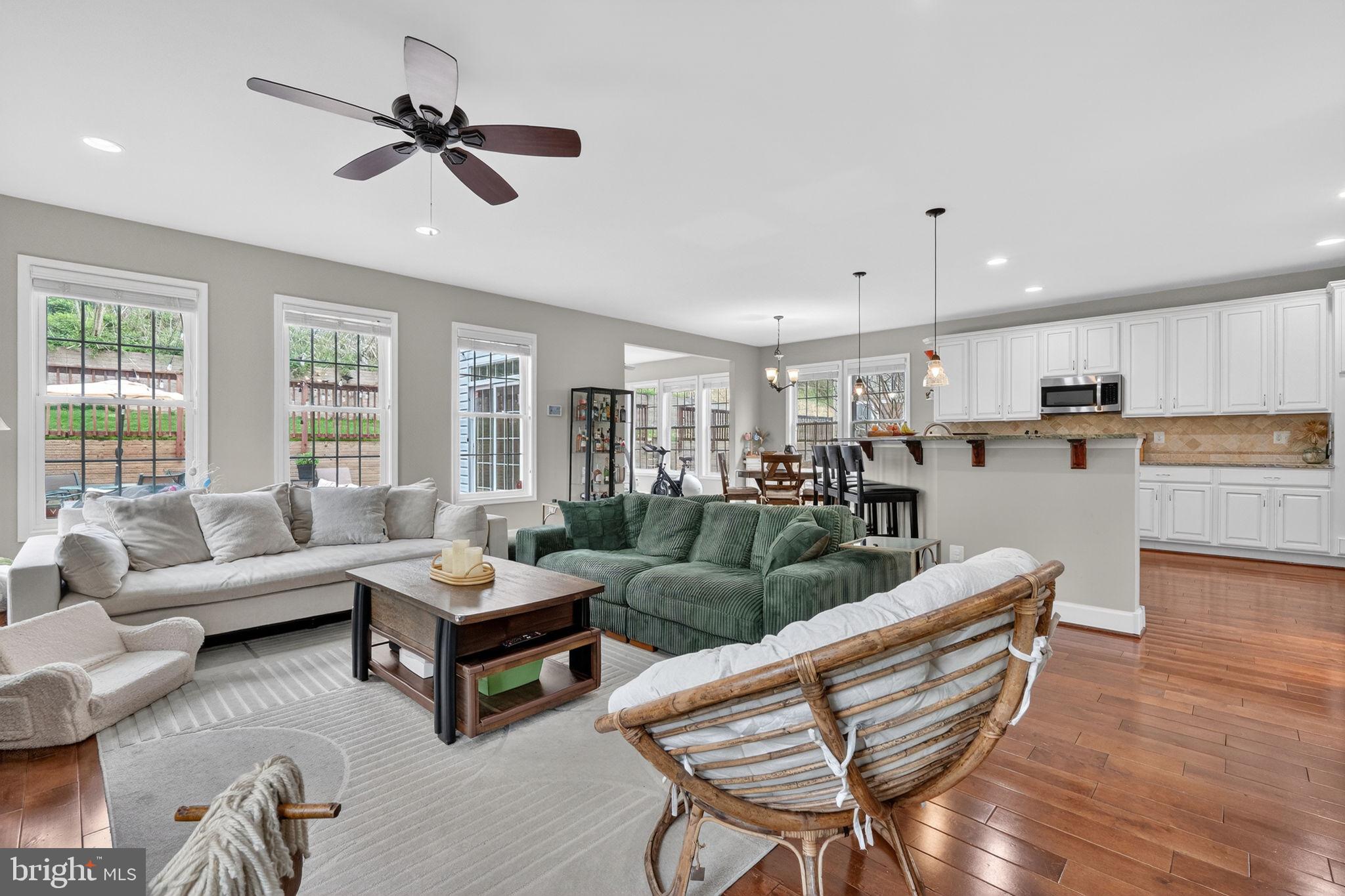 3112 Spring Drive Alexandria, VA 22306 - Photo 15 of 58 a living room with furniture and kitchen view