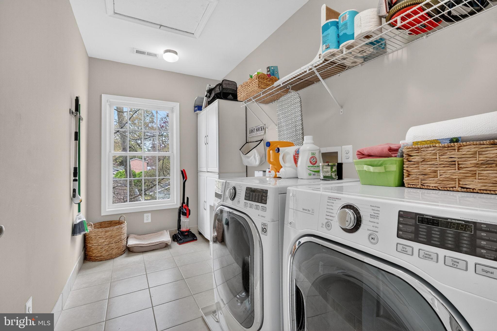 3112 Spring Drive Alexandria, VA 22306 - Photo 34 of 58 a utility room with dryer and washer