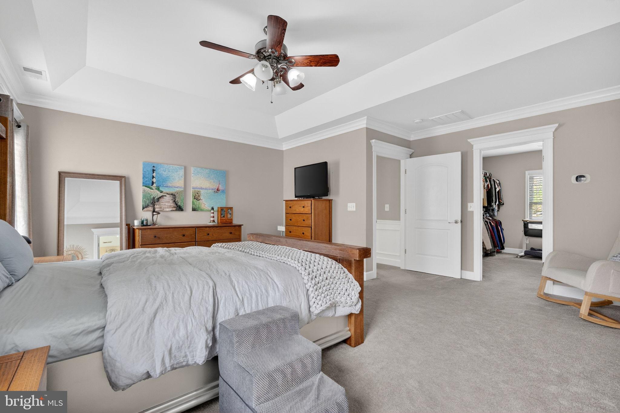 3112 Spring Drive Alexandria, VA 22306 - Photo 36 of 58 a bedroom with a bed and ceiling fan