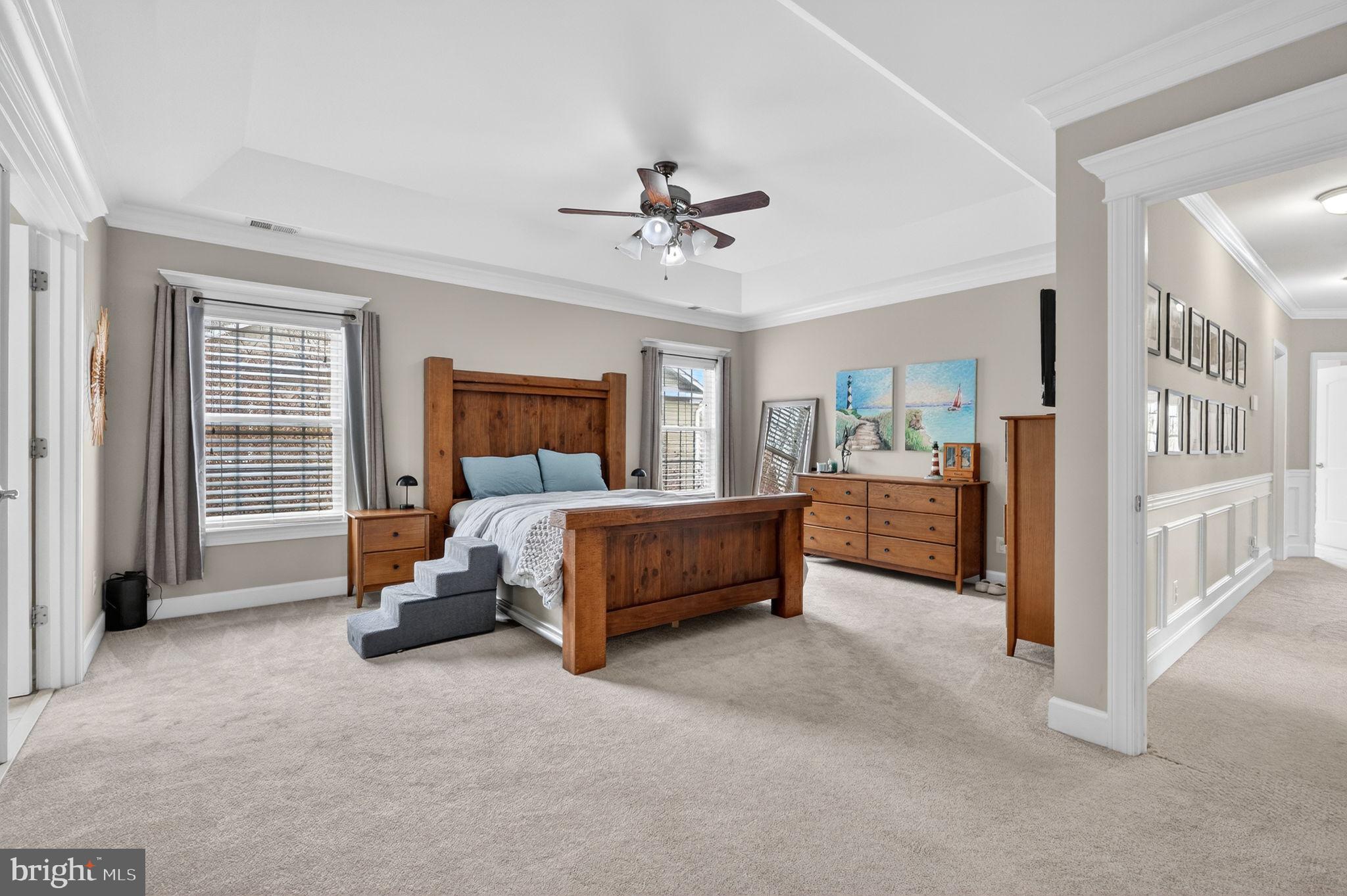 3112 Spring Drive Alexandria, VA 22306 - Photo 37 of 58 a bedroom with a bed and a chandelier
