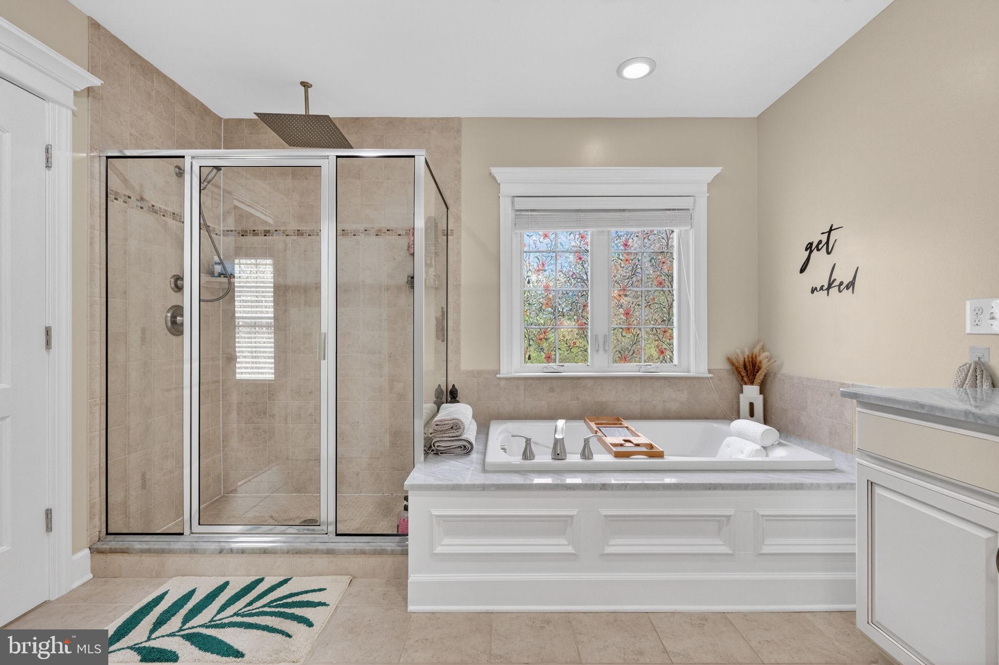 3112 Spring Drive Alexandria, VA 22306 - Photo 41 of 58 a bathroom with a bathtub and a shower