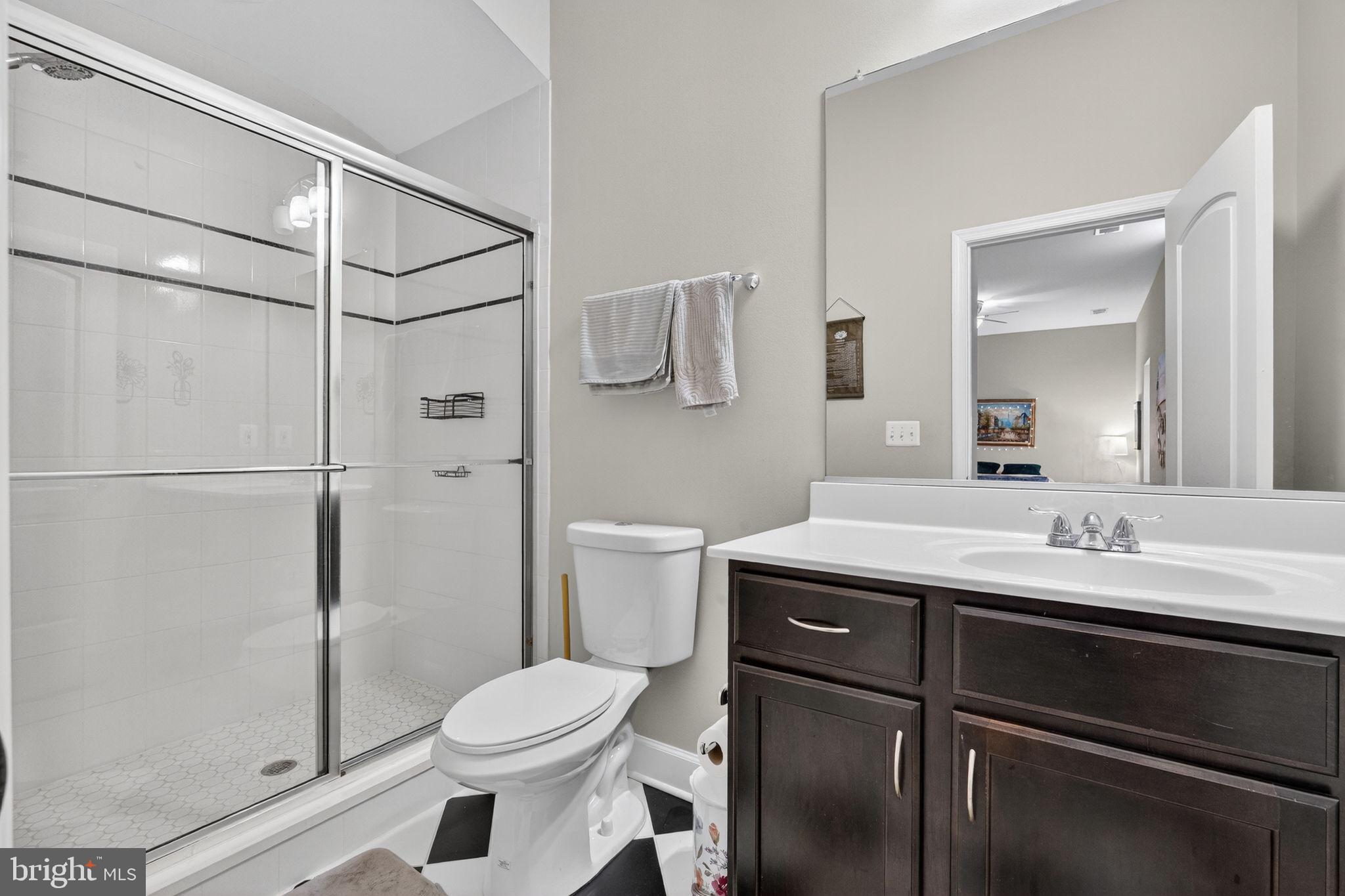3112 Spring Drive Alexandria, VA 22306 - Photo 47 of 58 a bathroom with a sink toilet and shower