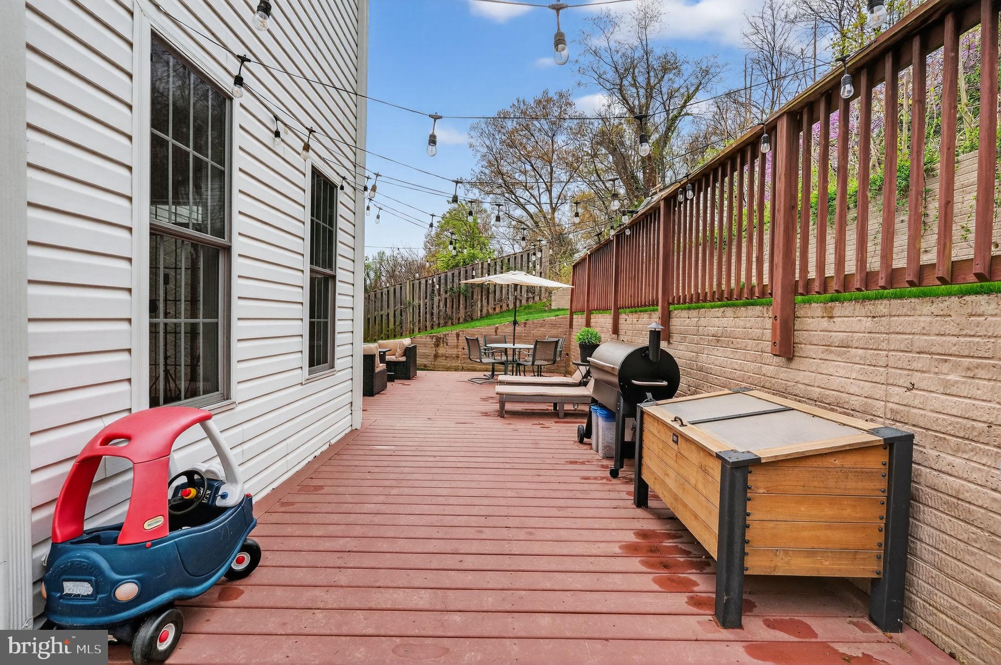 3112 Spring Drive Alexandria, VA 22306 - Photo 53 of 58 a view of a patio with wooden floor and a potted plant