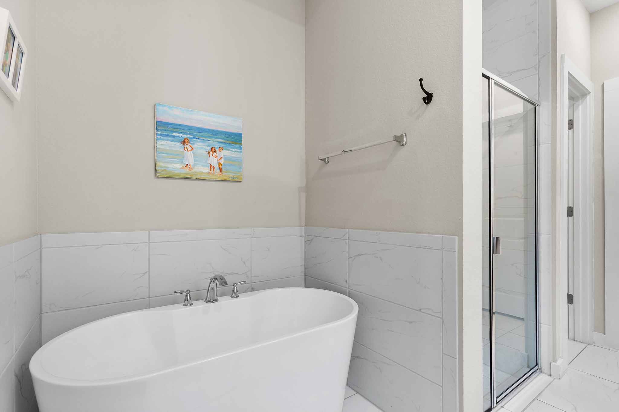 7717 Pace Ravine Drive Lago Vista, TX 78645 - Photo 19 of 39 a white bath tub sitting next to a white sink