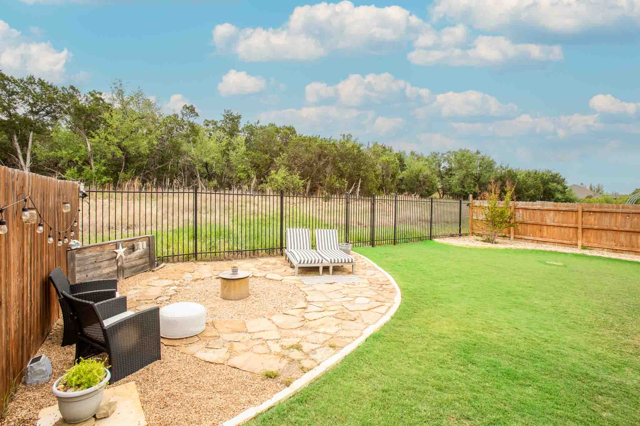 7717 Pace Ravine Drive Lago Vista, TX 78645 - Photo 32 of 39 a view of a backyard with sitting area