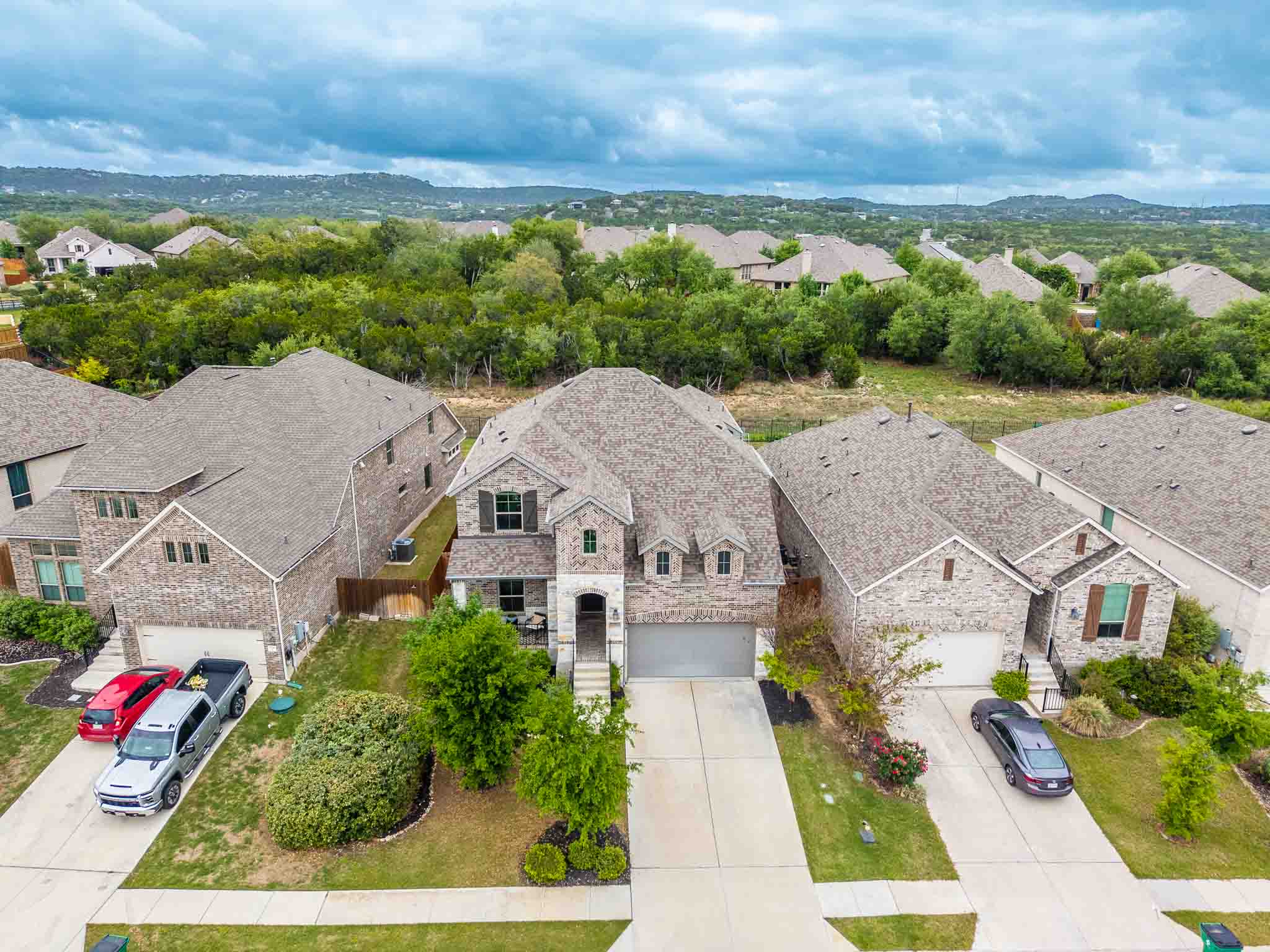 7717 Pace Ravine Drive Lago Vista, TX 78645 - Photo 33 of 39 an aerial view of a house with a garden