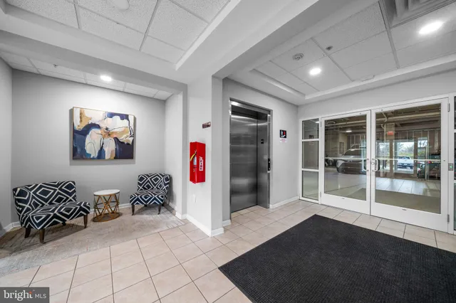 a view of a hallway with workspace